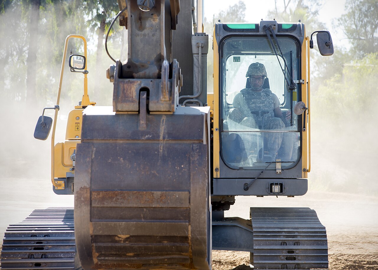 Excavation work near buried utilities — where accurate locating prevents strikes.