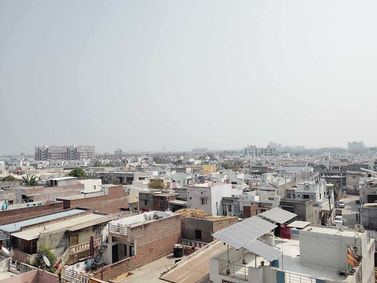Rooftop solar panels on homes — distributed energy resources on the grid edge.