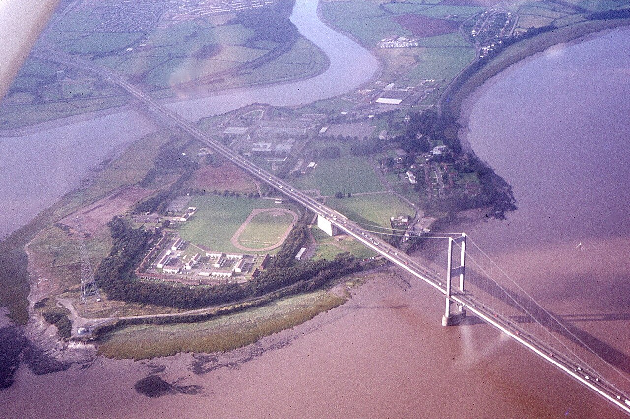An aerial view of motorway bridges and the road corridor below.